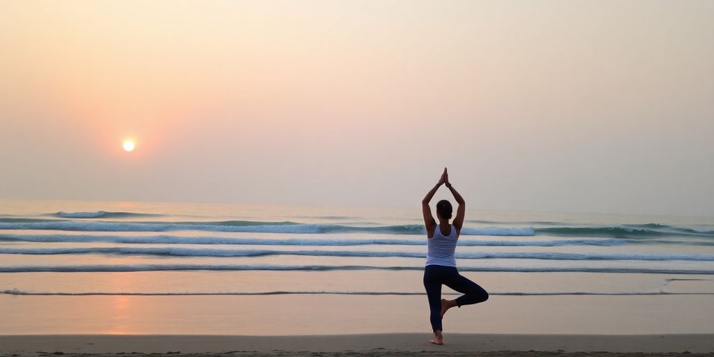 A peaceful beach scene with a practicing yoga person.